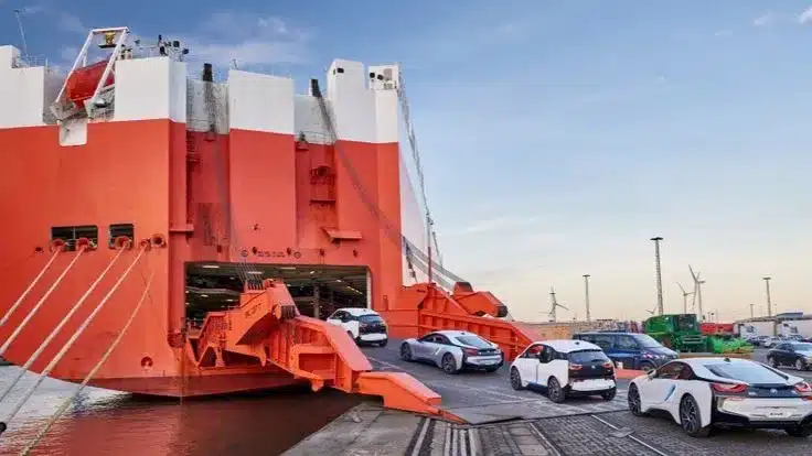 Cars driving onto a RoRo vessel for vehicle shipping from Dubai